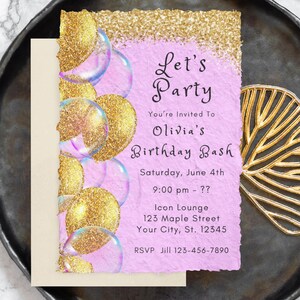 May include: Pink birthday party invitation with gold glitter and bubbles. The text reads "Let's Party You're Invited To Olivia's Birthday Bash Saturday, June 4th 9:00 pm - ?? Icon Lounge 123 Maple Street Your City, St. 12345 RSVP Jill 123-456-7890"