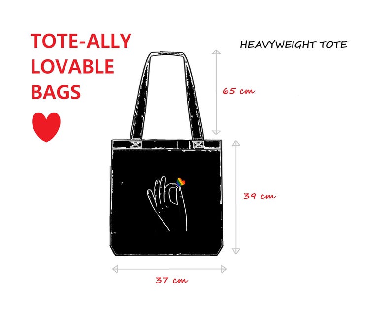 A diagram of a black heavyweight tote shows its dimensions. On the bag is a simple image of a hand holding a rainbow heart.