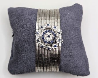 Cuff bracelet in 18k white gold and sapphires