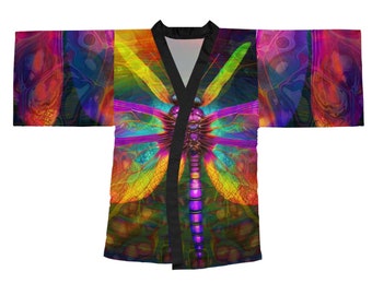 May include: A colorful kimono with a large dragonfly design. The dragonfly is a vibrant mix of purple, yellow, and green, with a black outline. The kimono is made of a soft, silky fabric.