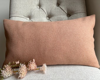 Neptune ‘Angus’ apricot pure wool cushion .