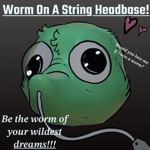May include: A green, cartoon-style headbase featuring large, round, dark eyes and a snout. Text reads: Worm On A String Headbase!, Would you love me if I was a worm?, and Be the worm of your wildest dreams!!! Two small purple hearts are visible.