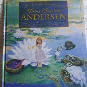May include: A hardcover book titled The Classic Treasury of Hans Christian Andersen, illustrated by Christian Birmingham and retold by Margaret Clark. The cover features a colorful illustration of a young child standing on a large lily pad.