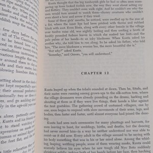 May include: Open book with text on the pages. The text includes the chapter title "CHAPTER 12" and the number "29" at the bottom of the right page. The text is in black font.