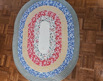 Colorful oval Jelly Roll Rug