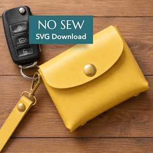 May include: A yellow pouch with a flap closure and a brass-colored snap button, attached to a matching yellow wrist strap and a black car key fob. A teal rectangular overlay features the white text NO SEW SVG Download.