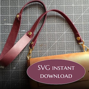 Könnte beinhalten: Ein burgunderfarbenes Lederband mit goldenen Beschlägen und eine braune Ledertasche mit dem Text "SVG INSTANT DOWNLOAD" darauf.