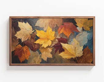 May include: A framed oil painting featuring a collection of colorful autumn leaves. The leaves are painted in shades of yellow, orange, red, and brown, with a dark background. The frame is made of dark wood.