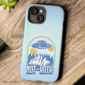 May include: A blue and yellow phone case with a graphic of a UFO flying over a mountain range. The text "NOT-HOTH!" is printed on the case.