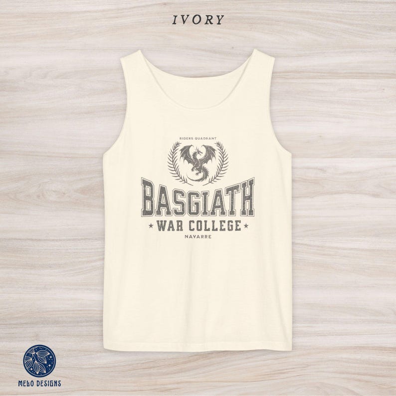 May include: Ivory tank top with a grey graphic of a dragon and the text "Basgiath War College Navarre" printed on the front.