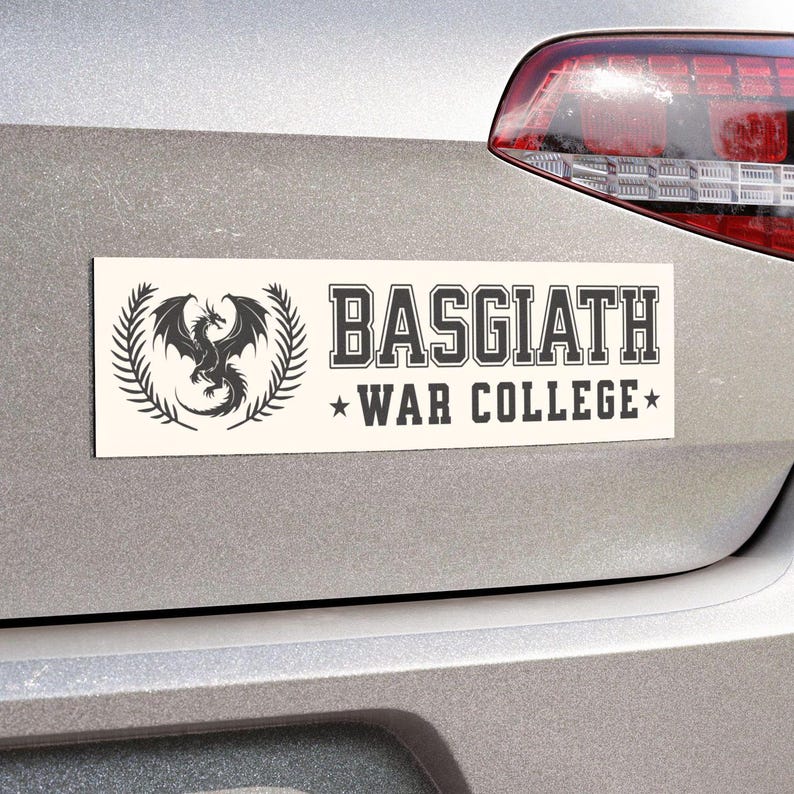 May include: White car magnet with a black dragon and the text "Basgiath War College" in black.