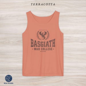 May include: Terracotta tank top with a black graphic of a dragon and the text "Basgiath War College* Navarre".