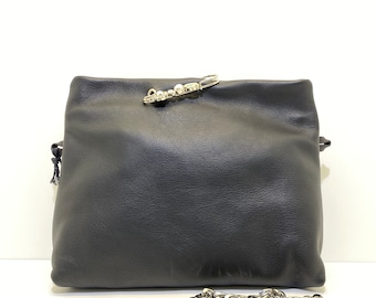 Elegant black leather clutch / crossbody bag / purse with shinny details