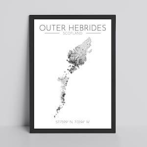 May include: Black framed print featuring a grayscale map of the Outer Hebrides, Scotland. The text "Outer Hebrides Scotland" is at the top, with coordinates 57.7599° N, 7.0194° W at the bottom. The map is a detailed representation of the islands.