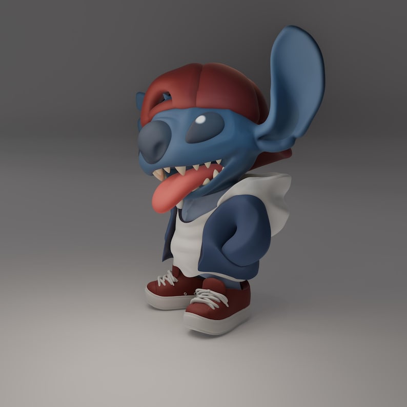 May include: A 3D rendered figure of a blue alien-like creature wearing a red baseball cap, a white hoodie, and a blue jacket. The figure has a long pink tongue sticking out and is wearing red sneakers.