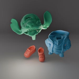 May include: A collection of 3D-printed items featuring a green character head with large ears and a wide grin, a blue hoodie, and two pairs of orange sneakers. The items appear to be floating against a gray background.