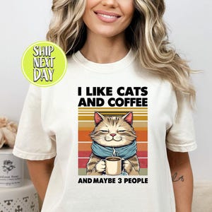 Adorable Cat With Coffee Mug And Cozy Scarf Tshirt, Cat With Coffee Shirt, Cute Animal Tee, Gift For Cat Mom, T Shirt For Cat Lovers - TC305