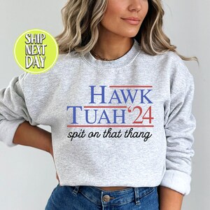 Hawk Tuah Spit On That Thang 2024 Sweatshirts, Social Media Quotes Hoodies, Humor Sweaters, Funny Sweatshirts, Funny TikTok Hoodies - FUN031