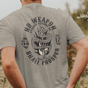 Christian Faith Shirt: No Weapon Formed Against Me Shall Prospers, Bible Verse Gift for Men, Scripture Verse Tee for Her, Spiritual Warfare