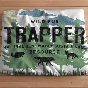 May include: White fabric with a green, blue, and white design. The text "WILD FUR TRUPPER NATURAL-RENEWABLE-SUSTAINABLE RESOURCE" is printed on the fabric. The fabric features a beaver, a wolf, and a fox.