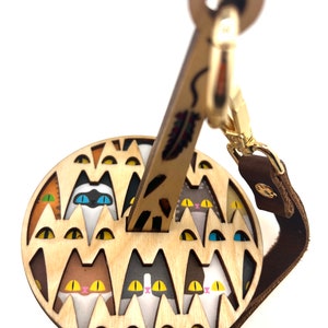 Mini Minder Meowsome Lemonwood (Patente en trámite): Portahilos portátil para la muñeca
