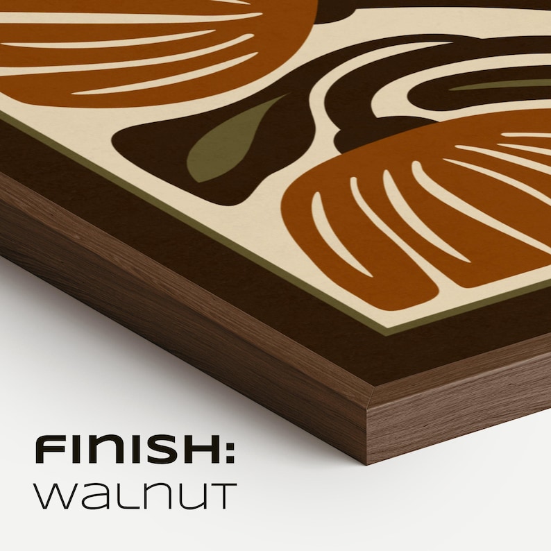 May include: A framed art print with a mid-century modern design. The artwork features abstract shapes in shades of brown, olive green, and cream, set against a cream background. The frame is walnut. The text "FINISH: WALNUT" is visible in the lower left corner.