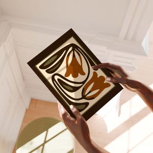 May include: A white ceramic mug with a black handle and the text "But First, Coffee" in a handwritten style. The mug is on a white surface. The mug is approximately 4 inches tall.