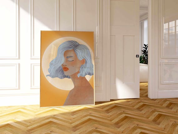 Girly wall art in boho style: feminine portrait of a serene woman with flowing blue hair and a full moon, perfect for chic, cozy spaces.