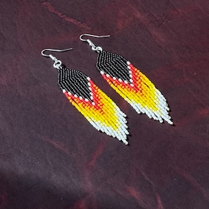 Black ombre fringe style earrings. Dangle. Multi Colored.