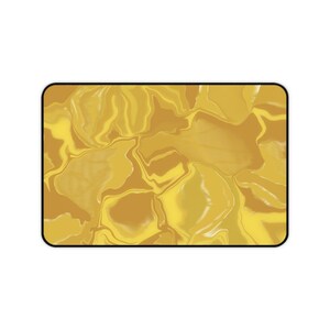 Puede incluir: Impresión digital de arte abstracto con un patrón de remolino en tonos de amarillo y marrón.