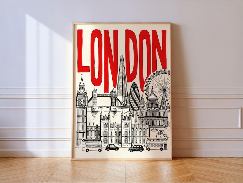 Peut inclure: Impression artistique encadr&eacute;e repr&eacute;sentant des monuments de Londres en noir et blanc, dont Big Ben, le Tower Bridge et le London Eye. Le mot "LONDON" est &eacute;crit en rouge en haut.