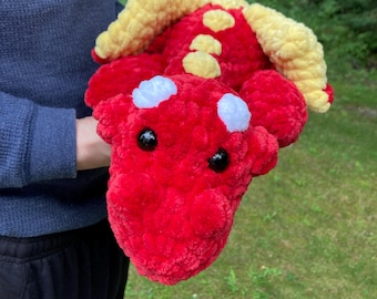 red crochet dragon plush