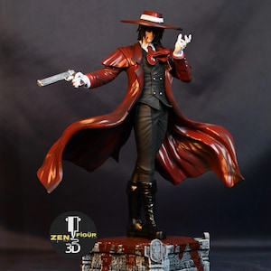 May include: A detailed figurine of a character in a long, flowing red coat, black pants, and boots, holding a silver pistol. The figure wears a hat and stands on a blood-splattered base. The figurine has a white shirt and tie.