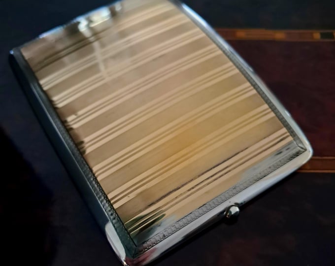 Featured listing image: Elegant cigarette case, first half of the 20th century, 830 silver, gold-plated in the centre with a blue cabochon on the clasp