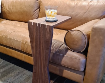 Hourglass style walnut C table. The perfect modern sofa or side table.