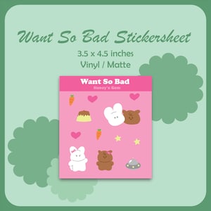 Puede incluir: Una hoja de pegatinas rosa con el texto "Want So Bad Stickersheet" y las dimensiones 8,9 x 11,4 cm. La hoja presenta ilustraciones de dibujos animados de zanahorias, corazones, un pastel, un conejito, un oso, estrellas y una nave espacial. El material es vinilo/mate.