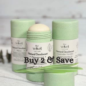 May include: Three green deodorant sticks with white labels. The middle stick is labeled "the velvet tallow Natural Deodorant *Peppermint*" and has a Buy 2 & Save message.