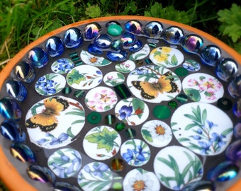 Monarch Butterfly and herbs bird bath. Made from vintage ceramics saved from landfill and glass pebbles. 20cm terracotta dish.