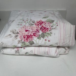 Rose print lined curtains