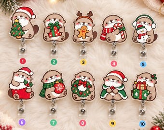 Könnte beinhalten: Ein Set aus zehn Ausweishaltern aus Acryl mit Cartoon-Ottern in verschiedenen weihnachtlichen Outfits und Accessoires, darunter Weihnachtsmützen, Schals, Geschenke, Kränze und Ornamente, jeweils mit einem nummerierten Etikett von eins bis zehn.