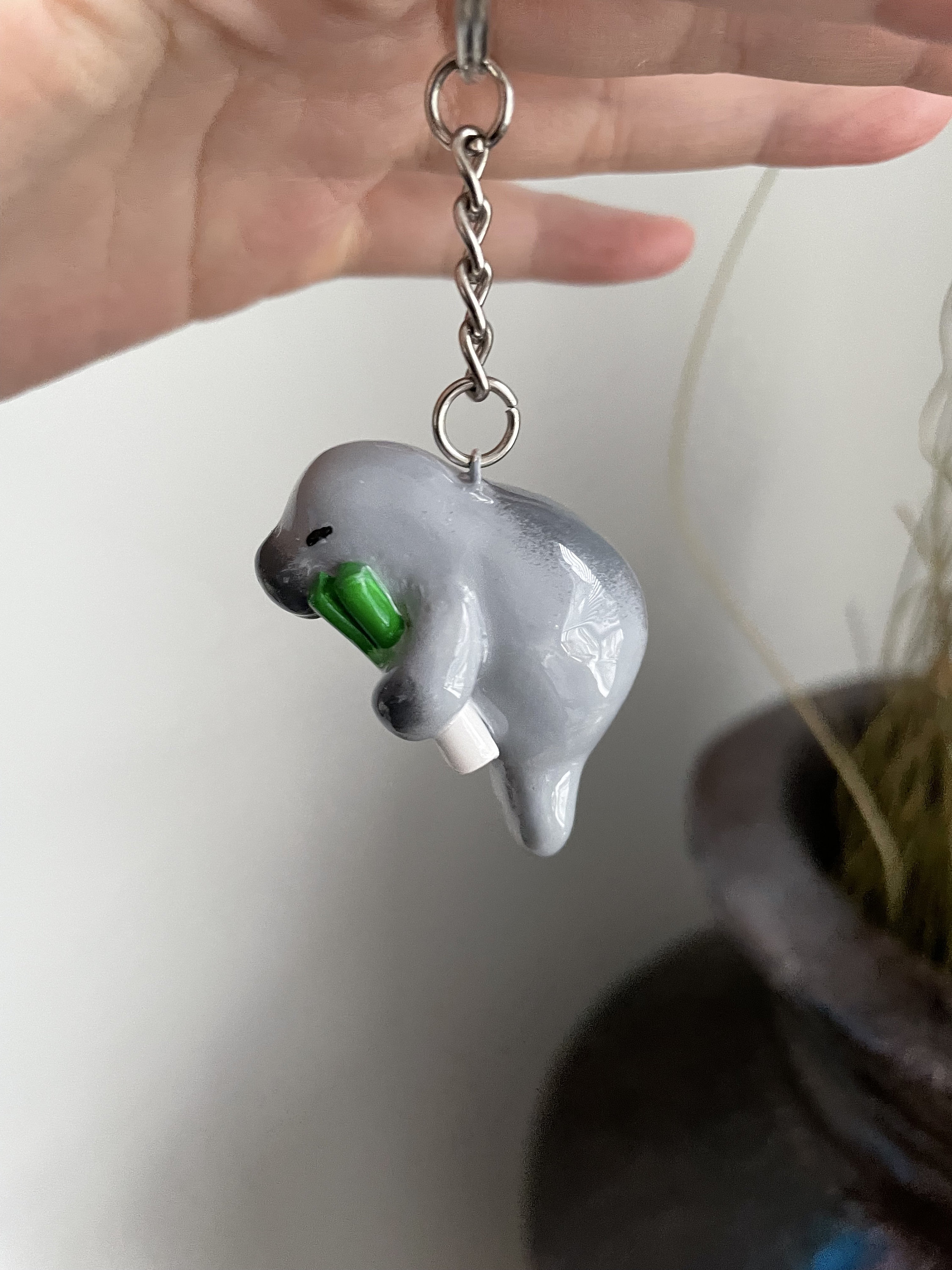 Manatee Holding a Leek Keychain Etsy Canada