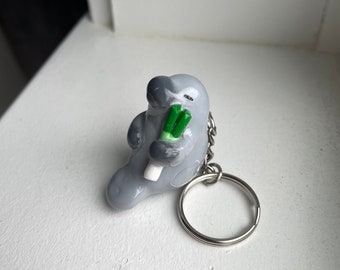 Manatee Holding a Leek Keychain