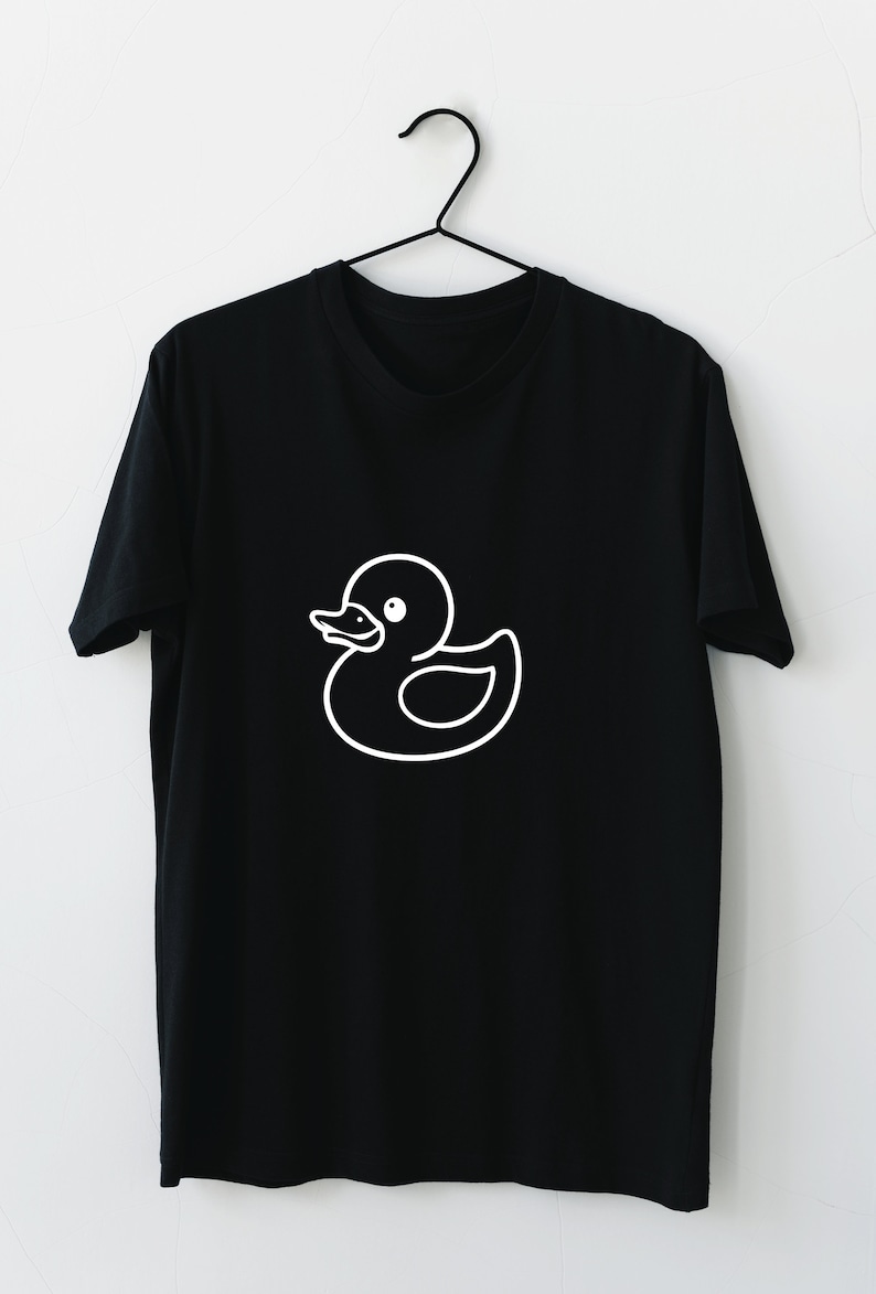 May include: A black t-shirt with a white outline of a rubber ducky on the front.