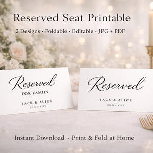 May include: Two white, folded place cards with the word "Reserved" in elegant script. One card reads "Reserved for Family" with names and a date. The background includes flowers, candles, and glassware.