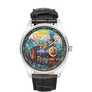 May include: A silver wristwatch with a black leather strap. The watch face features a colourful stained glass design of a steam locomotive travelling through a mountain landscape. The numbers 105, 110, 115, 120, 125, 130, 135, 140, 145, 150, 155, 160 are printed around the edge of the watch face.