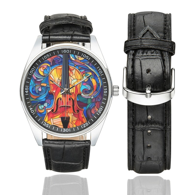 May include: A black leather wristwatch with a silver case and a colorful stained glass design of a violin on the face. The watch face has numbers from 40 to 160.