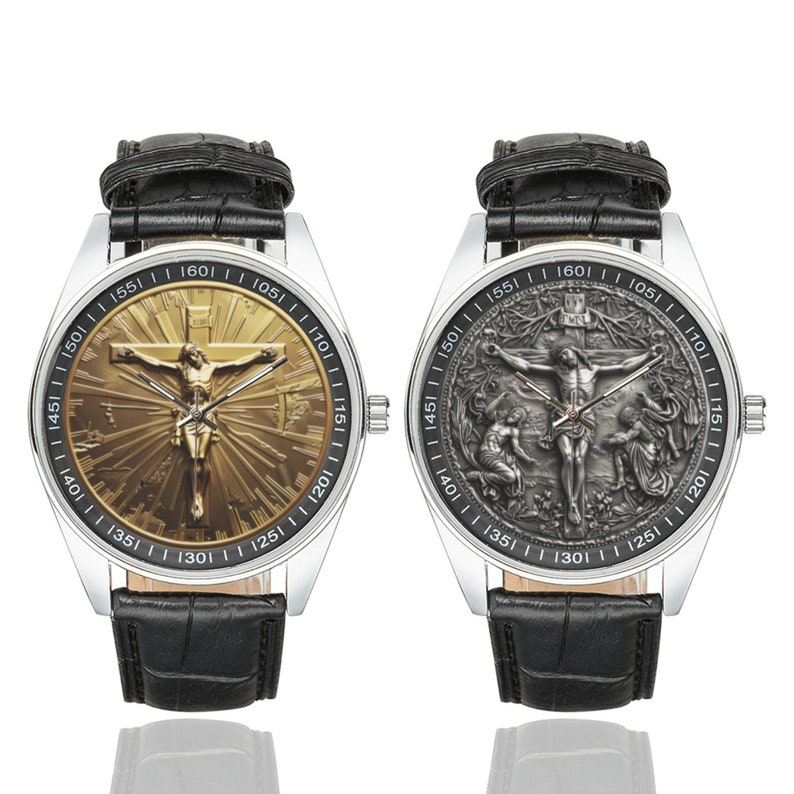May include: Two silver wristwatches with black leather bands. The watch faces feature a gold and silver image of Jesus Christ on the cross. The gold watch face has a sunburst design. The silver watch face has a more detailed image with a background of trees and people.