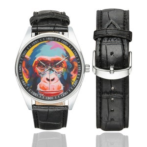 Peut inclure: Une montre-bracelet en cuir noir avec un cadran argent&eacute; et une illustration color&eacute;e de singe. Le cadran de la montre comporte des chiffres de 10 &agrave; 60 autour du bord. La montre a un bracelet en cuir noir avec une boucle argent&eacute;e.