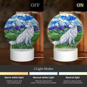May include: A white dog sitting in a field with mountains in the background. The image is a stained glass design and is used for a 3D night light. The night light has three light modes: warm white, normal white, and neutral.
