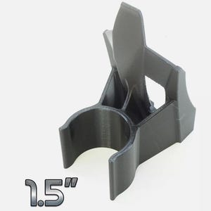 May include: Black plastic phone holder with a 1.5" diameter opening. The holder has a flip-up design to protect the phone screen.